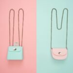 Stylish pastel handbags on pink and mint split backgrounds, perfect for fashion and design themes.